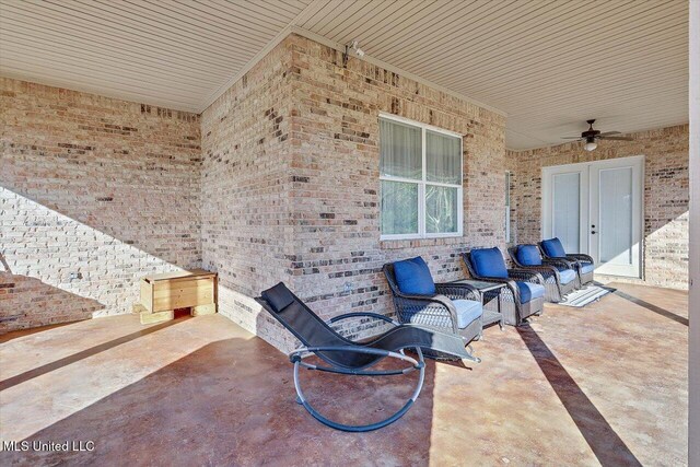 view of patio / terrace featuring ceiling fan