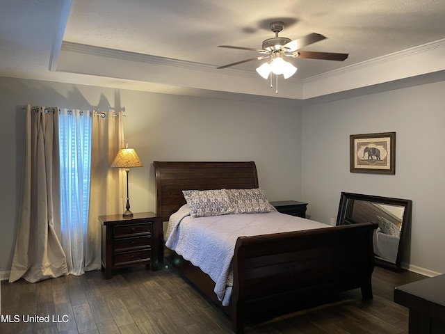 130 Eastwood Cir, Florence, MS 39073 - bedroom featuring wood finished floors, crown molding, a tray ceiling, and ceiling fan