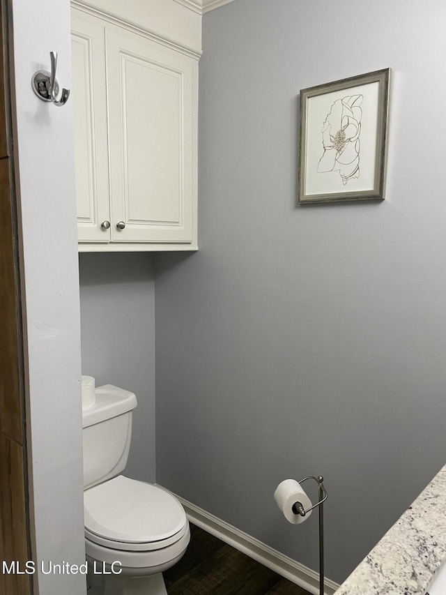 130 Eastwood Cir, Florence, MS 39073 - bathroom featuring baseboards and wood finished floors