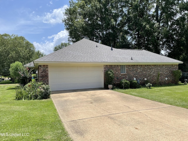 130 Eastwood Cir, Florence, MS 39073 - view of front of property featuring brick siding, a shingled roof, an attached garage, and a front lawn