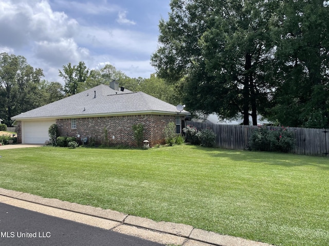 130 Eastwood Cir, Florence, MS 39073 - view of home's exterior with a garage, brick siding, concrete driveway, and a chimney