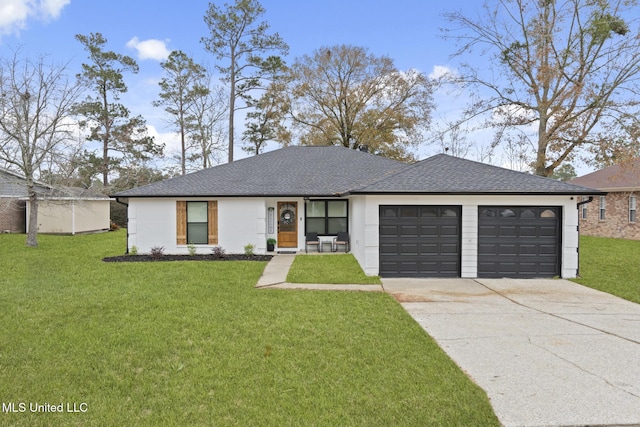 single story home with a garage and a front lawn