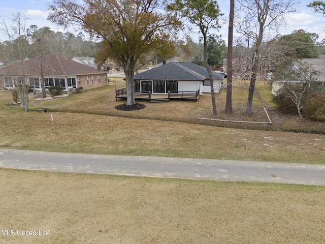 view of front of home with a front lawn