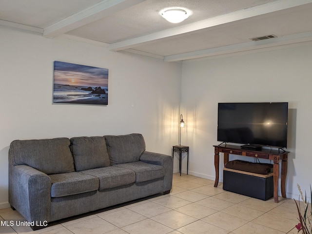3607 Pentagon Dr, Pascagoula, MS 39581 - living area with beam ceiling, light tile patterned flooring, and baseboards