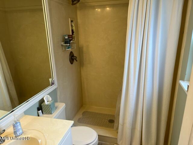 1916 2nd St Unit 2, Gulfport, MS 39501 - full bathroom with a shower stall and vanity