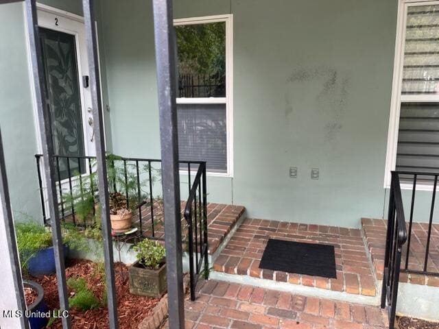 1916 2nd St Unit 2, Gulfport, MS 39501 - entrance to property featuring stucco siding