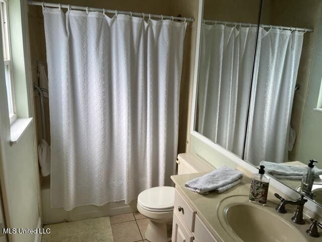 1916 2nd St Unit 2, Gulfport, MS 39501 - full bath featuring tile patterned floors, vanity, and shower / bathtub combination with curtain