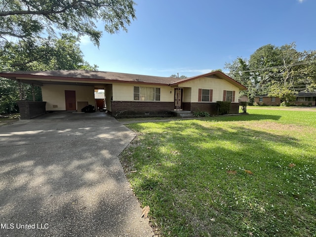 ranch-style house with a carport, concrete driveway, brick siding, and a front yard
