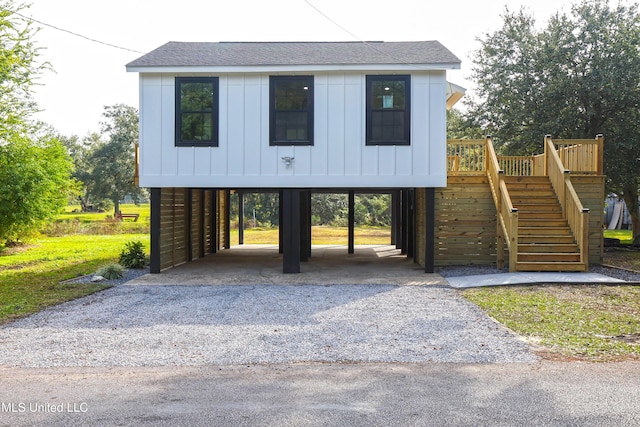 view of front of home with a carport