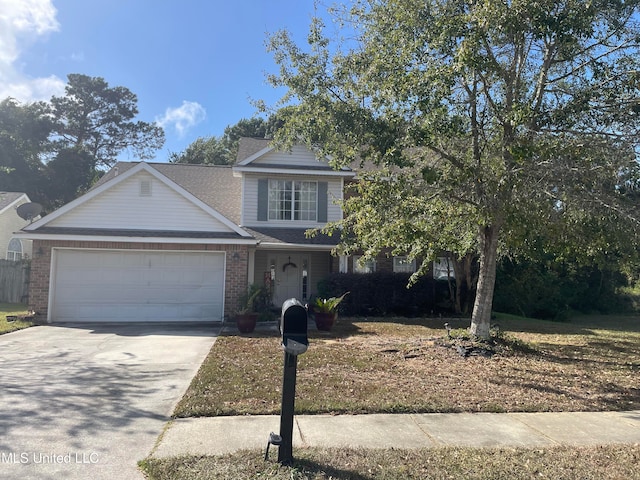 view of front of property with a garage