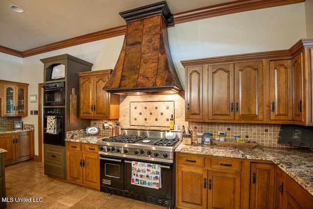 305 Creekbend Rd, Natchez, MS 39120 - kitchen featuring double oven range, premium range hood, crown molding, brown cabinetry, and backsplash