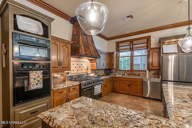 305 Creekbend Rd, Natchez, MS 39120 - kitchen featuring appliances with stainless steel finishes, brown cabinetry, light stone counters, and ornamental molding