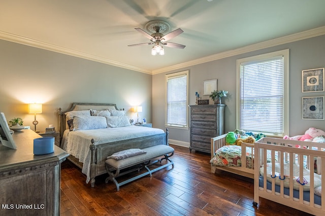 bedroom with ceiling fan, dark hardwood / wood-style floors, and crown molding