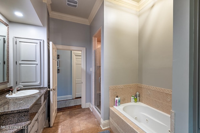 bathroom featuring ornamental molding, vanity, and separate shower and tub