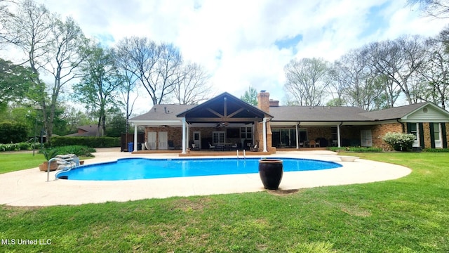 305 Creekbend Rd, Natchez, MS 39120 - outdoor pool featuring a ceiling fan, a patio area, and a lawn