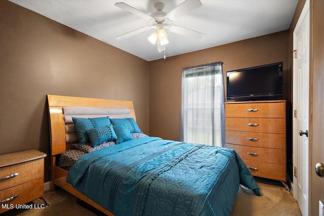 bedroom with carpet flooring and a ceiling fan