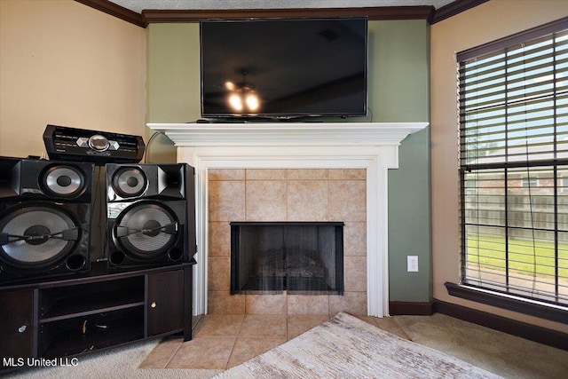 detailed view of a fireplace, ornamental molding, and carpet