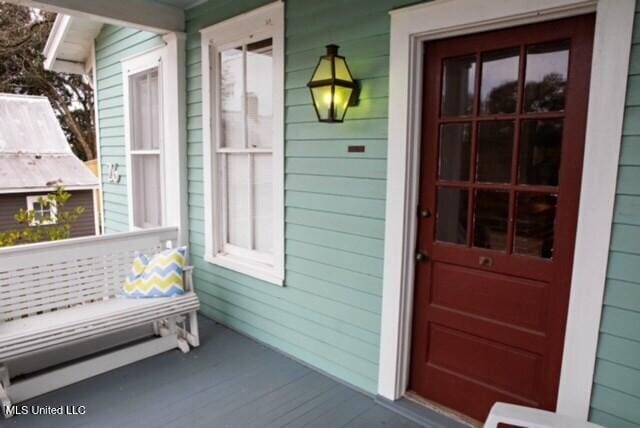 entrance to property with a porch