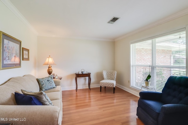 1 Partridge Pl, Long Beach, MS 39560 - living room featuring light wood-style flooring, ornamental molding, and baseboards
