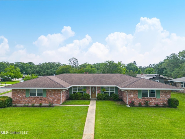 1 Partridge Pl, Long Beach, MS 39560 - ranch-style house featuring brick siding, a front lawn, and roof with shingles