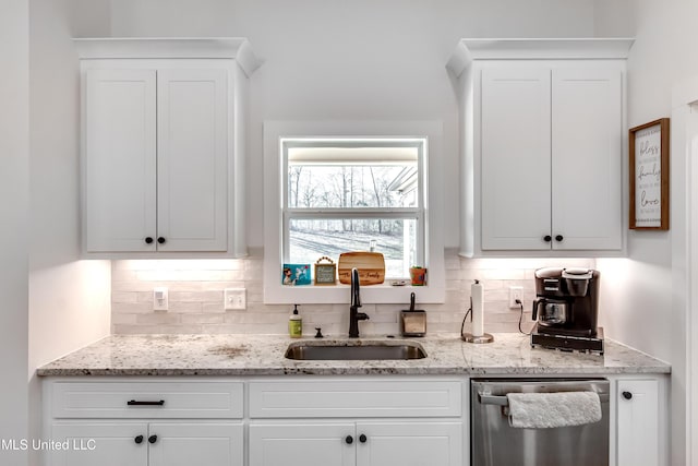 bar with dishwasher, sink, and white cabinets