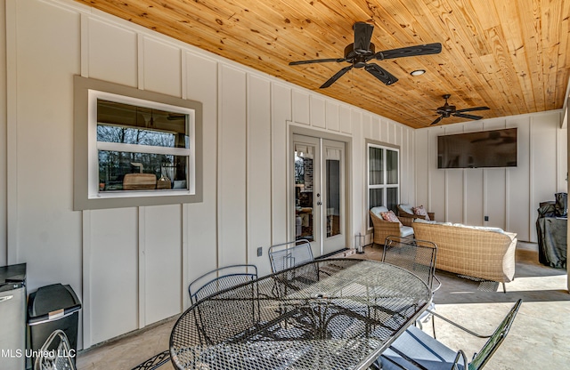 view of patio / terrace featuring french doors and ceiling fan