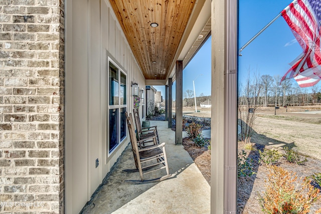 view of patio featuring a porch