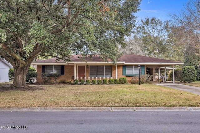 single story home featuring a carport and a front yard