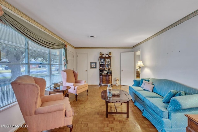 living room featuring light parquet floors and ornamental molding