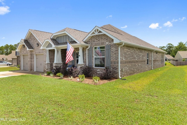16872 W Landon Green Cir, Gulfport, MS 39503 - view of front of home featuring brick siding, a front lawn, concrete driveway, and an attached garage
