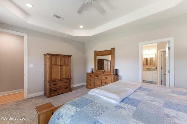 16872 W Landon Green Cir, Gulfport, MS 39503 - bedroom with light carpet, a tray ceiling, baseboards, recessed lighting, and a ceiling fan