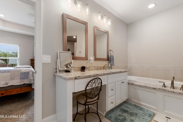 16872 W Landon Green Cir, Gulfport, MS 39503 - full bathroom featuring ensuite bathroom, vanity, a garden tub, and recessed lighting