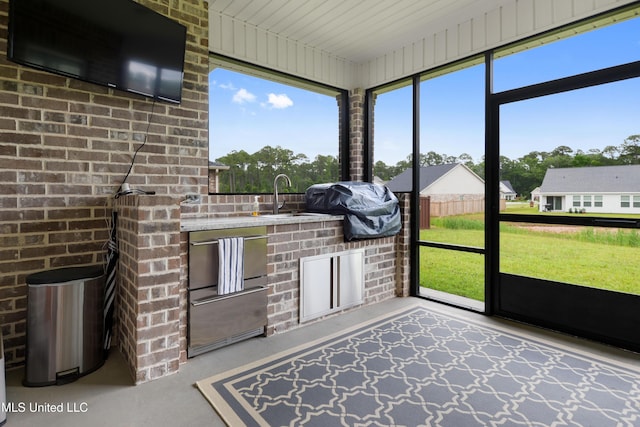 16872 W Landon Green Cir, Gulfport, MS 39503 - unfurnished sunroom with area for grilling and a sink