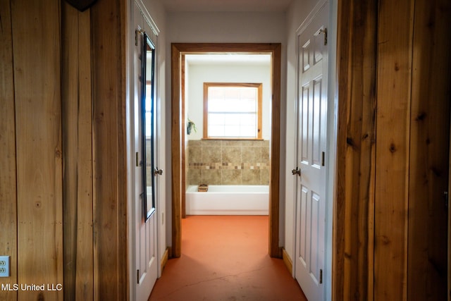 corridor featuring concrete floors