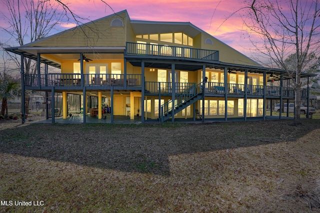 6132 Shawnee St, Kiln, MS 39556 - rear view of property featuring ceiling fan, a deck, stairway, and a patio area