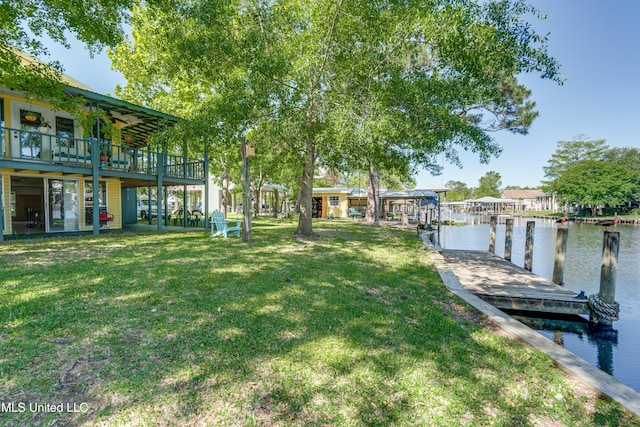 6132 Shawnee St, Kiln, MS 39556 - dock area with a water view and a lawn