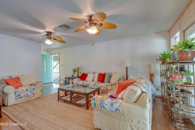 6132 Shawnee St, Kiln, MS 39556 - living room featuring plenty of natural light, ceiling fan, and wood finished floors