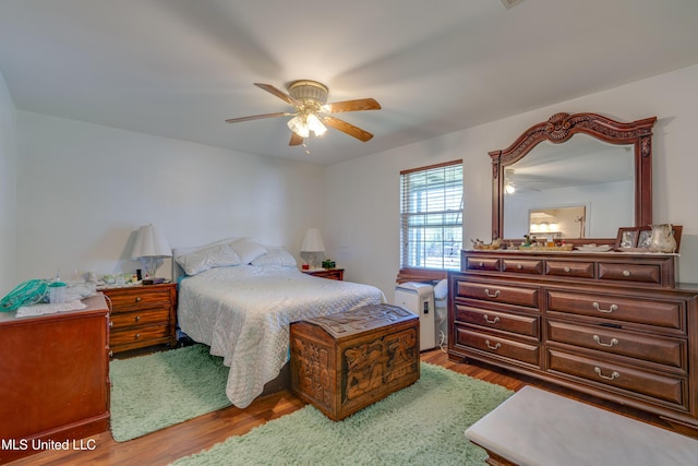 6132 Shawnee St, Kiln, MS 39556 - bedroom featuring wood finished floors and ceiling fan