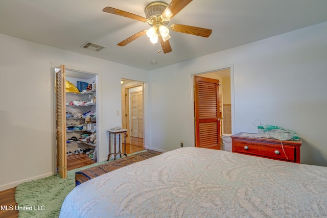 6132 Shawnee St, Kiln, MS 39556 - bedroom featuring wood finished floors, ceiling fan, and a closet