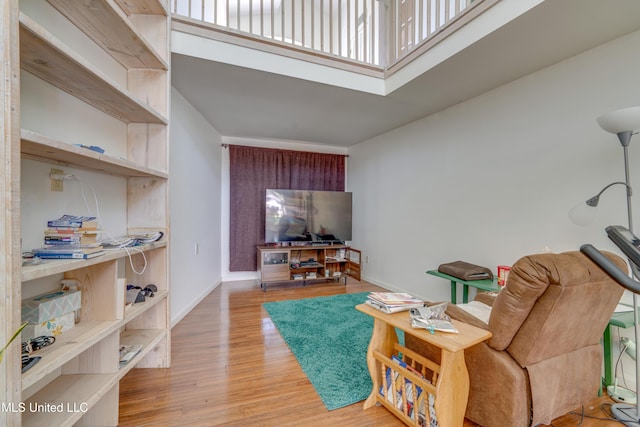 6132 Shawnee St, Kiln, MS 39556 - living room featuring wood finished floors and baseboards