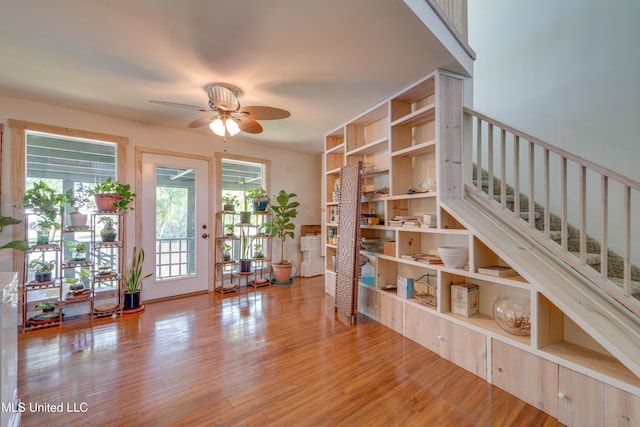 6132 Shawnee St, Kiln, MS 39556 - interior space with ceiling fan, wood finished floors, and stairs