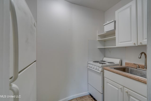 6132 Shawnee St, Kiln, MS 39556 - kitchen with electric range, white cabinets, and open shelves