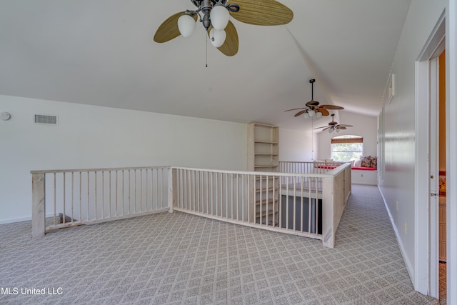 6132 Shawnee St, Kiln, MS 39556 - carpeted spare room with ceiling fan and lofted ceiling