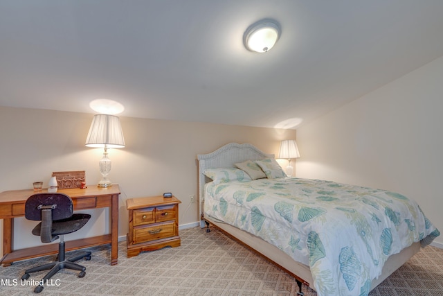 6132 Shawnee St, Kiln, MS 39556 - bedroom with light carpet and an office area