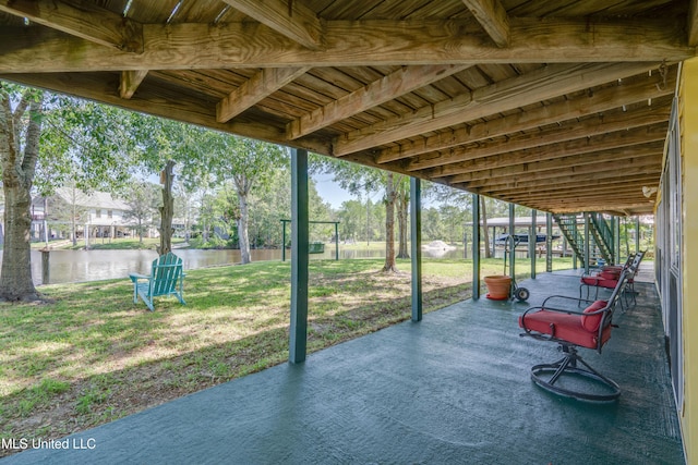 6132 Shawnee St, Kiln, MS 39556 - view of patio with stairs and a water view