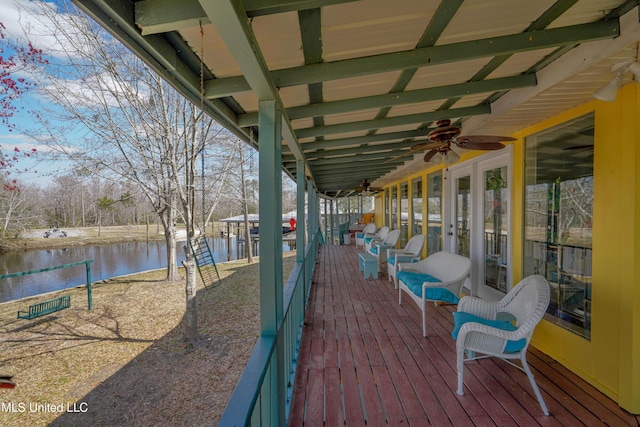 6132 Shawnee St, Kiln, MS 39556 - deck with a water view and ceiling fan