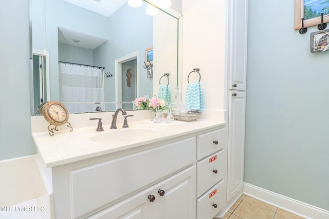 bathroom featuring tile patterned floors and vanity