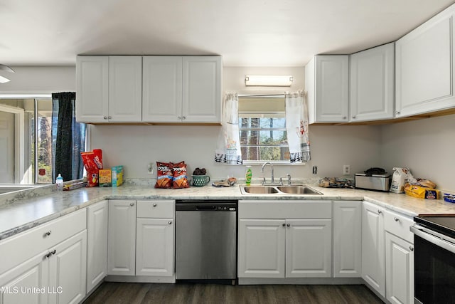 kitchen with range with electric cooktop, dark hardwood / wood-style floors, sink, white cabinets, and stainless steel dishwasher