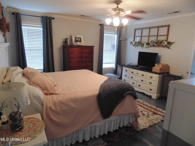 70 Tree Line Dr, Mount Pleasant, MS 38635 - bedroom featuring crown molding, wood finished floors, and a ceiling fan