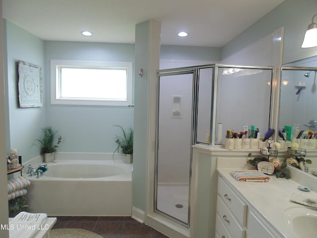 70 Tree Line Dr, Mount Pleasant, MS 38635 - full bath with a shower stall, a bath, tile patterned flooring, vanity, and recessed lighting